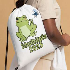 Fröhlicher Kordelzug-Beutel „Schulhüpfer 2025“ mit lachendem Frosch und Fliege, ideal für den Schulstart.
